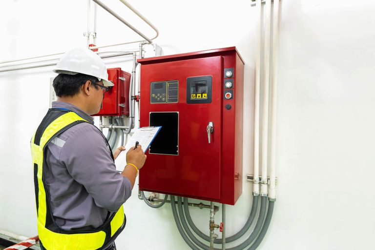 Sugar Bear technician conducting an electrical inspection